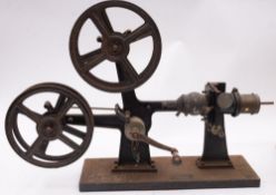 An early 20th century 35mm hand driven projector, maker W Butcher & Sons, Camera House, London,
