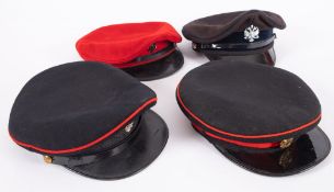 A group of four British Regimental peaked caps, including 1st Queen's Dragoon Guards,