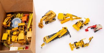 NZG (Germany) An unboxed collection of 1/35th scale construction vehicles, including No.