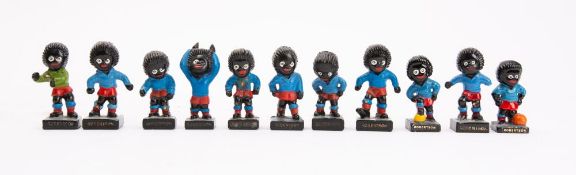 Robertson Marmalade Footballers, a group of eleven figures, nine are hand painted resin,