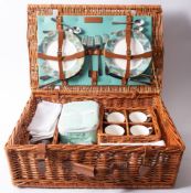 A Fortnum & Mason picnic set in wicker hamper., 22 x 59 x 40cm.