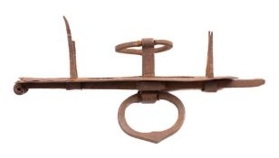 A wrought iron door bolt,
