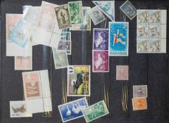 An accumulation of stamps and first day covers.