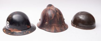 A WWII French dispatch rider's helmet,, with brown leather interior and label 'Geno, Paris',