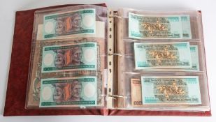 A mixed album of world banknotes, including USA, Russia, Germany ,