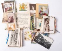 A small collection of early 20th century postcards and greetings cards.
