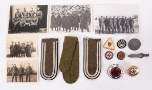 A small collection of German Militaria, including and NSDAP badge,