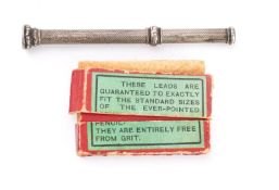 A whitemetal propelling pencil by S Mordon & Co, inset vacant circular bloodstone seal to final,