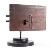 A 17th century French steel engraved rim lock with key: double angled bolts within a case with