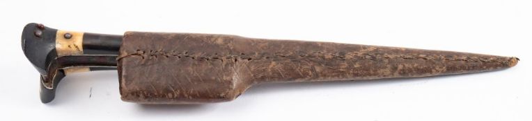 A late 19th century Indo-Persian Pesh Kabz, the traditional shaped blade with brass hilt,