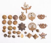A small collection of Regimental cap badges and buttons,