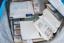 An accumulation of Great British presentation stamp packs and first day covers.