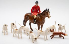 Beswick Huntsman model 1501, brown colourway; together with eight hounds and fox.