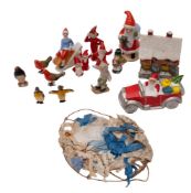 A collection of late 19th/ early 20th century Continental bisque Christmas cake decorations,