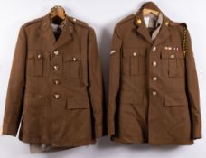 A Royal Signals Uniform together with a Royal Logistic Corps uniform.