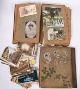 An early 20th century Postcard Album and contents, Tucks and other makers,