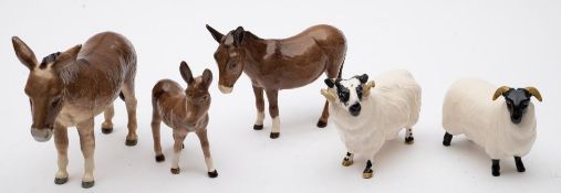 Beswick Donkey and two Foals; together with Black Faced Ram and Uwe.