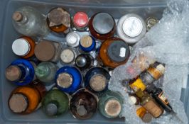 A collection of early to mid 20th century photography developing bottles and other similar bottles