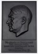 WITHDRAWN LOT A black painted cast iron rectangular wall plaque with relief bust portrait of