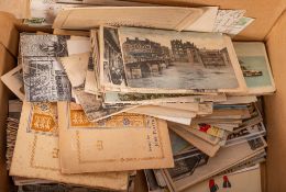 A collection of early 20th century and later postcards,