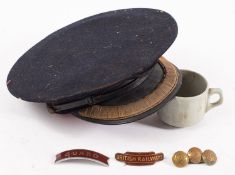 A British Rail Station Master's peaked cap, together with an enamel British Railways shoulder badge,