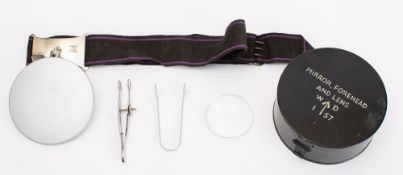 A Post-War British Army Issue Forehead Mirror and Lens, circa 1957,