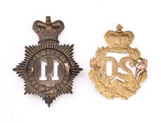 20th Regiment of Foot (East Devon) Glengarry badge, with Queen's crown over laurel wreath,