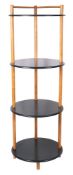 A stained beech and green painted four tier etagere,
