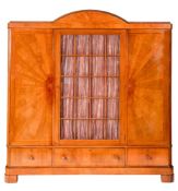 A mahogany triple front wardrobe in Art Deco style,