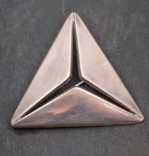 Flemming Eskildsen for Georg Jensen, a triangular silver brooch with open centre, design nr 341,
