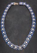 Willy Winneass for David Andersen, Oslo, Norway, a 1950's silver and blue enamel bracelet,