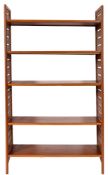 A teak modular wall shelving unit, probably by Ladderax, circa 1960s; with five adjustable shelves,