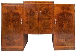 A burr walnut dining table and pedestal sideboard en suite, in Art Deco style,