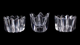 Three Orrefors heavy glass bowls, of externally ribbed flower head form,