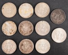 USA - eleven 1964 USA half dollars.