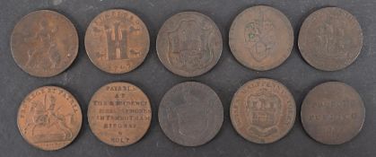 Ten copper 18th Century trade tokens.
