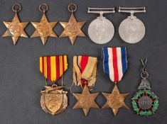 A WWII group of five with remains of card case to '76620 R Wood R W Kent R',