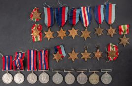 A collection of WWII service medals, comprising nine 1939-45 War Medals,