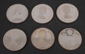Six silver Jubilee silver proof crowns.