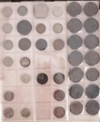 Two albums containing mixed coins.