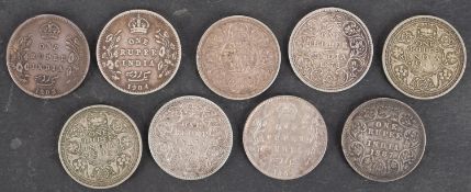 Nine Indian Rupees including 1878, 1880 and 1887, 1903, two 1904, 1918 and two 1943.