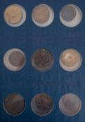 An album of mixed coins and tokens.