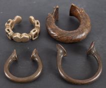 Four African Manillas.