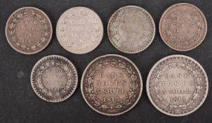 An 1811 and 1815 Bank of England three shillings tokens,