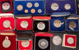 A large bag of proof sets, crowns etc including silver.