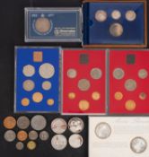 A collection of boxed coins and sets including silver, 1974 Iceland, two Maria Theresa Thalers,