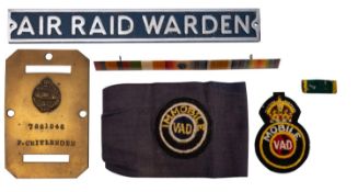 A WWII Mobile VAD Armband and cloth cap badge,