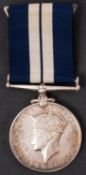 A WWII Distinguished Service Medal to 'D/J 2937 T Hall CPO', in an associated case.