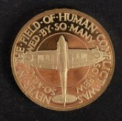 An 18ct gold Battle of Britain medallion by Metal Import Limited 1965.