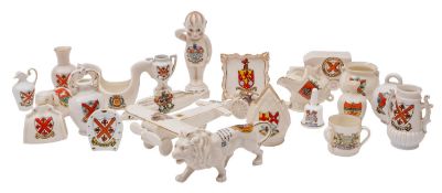 A collection of various crested ware, including a WWI monoplane, a field gun , a submarine,